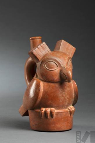 Botella con representación de búho