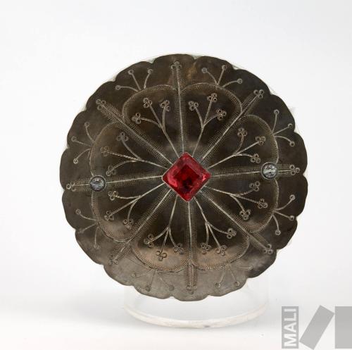 Placa de traje de danzante