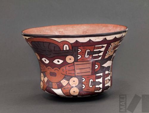 Taza con diseños del ser mítico antropomorfo