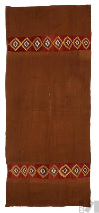 Uncu con diseño de rombos escalonados