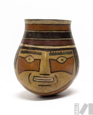 Vaso que representa cabeza humana