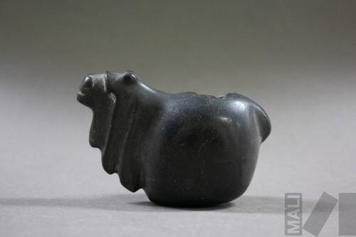 Conopa en forma de camélido