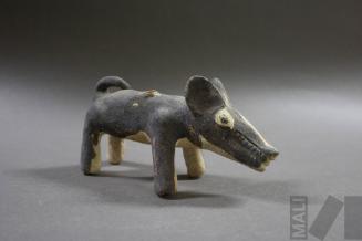 Conopa en forma de cánido