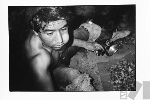 Minero con coca
